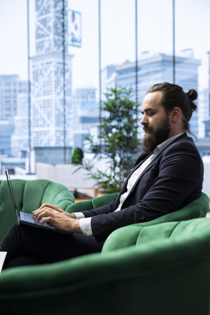 entrepreneur sitting in his office and working on pc for productivity